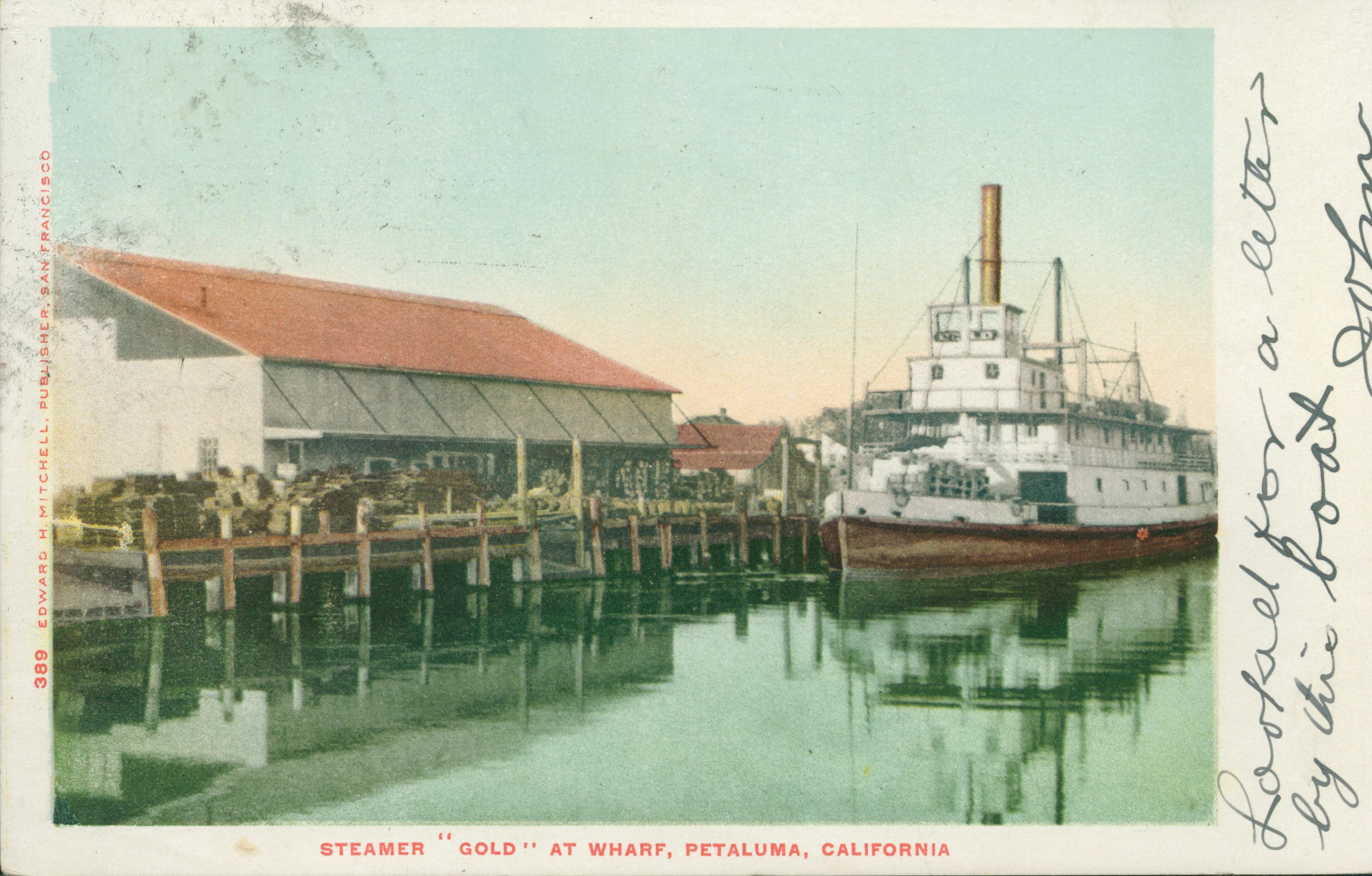 Shows a steamer at a wharf in Petaluma